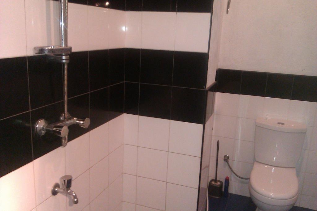 Nilas Guesthouse Хикадува Стая снимка