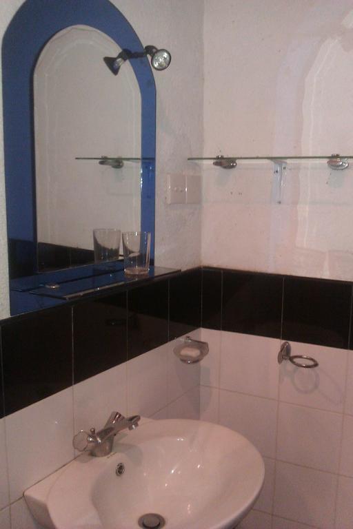 Nilas Guesthouse Хикадува Стая снимка
